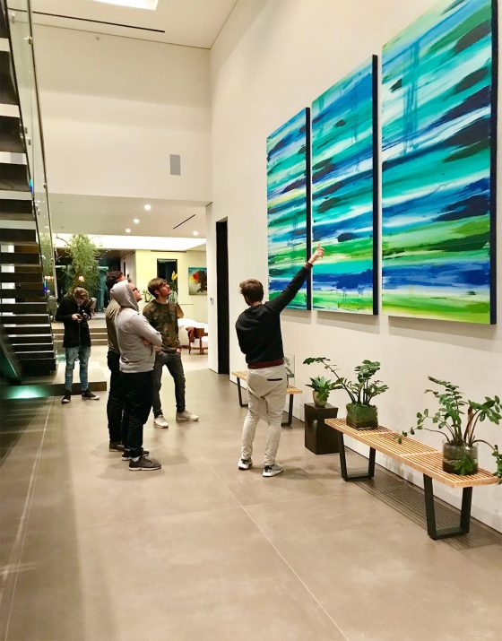 Custom triptych installation into DJ Zedd private residence by Erik Skoldberg in a collector’s modern home, featuring green and teal abstract layers designed to elevate luxury interiors through investment-grade statement artwork